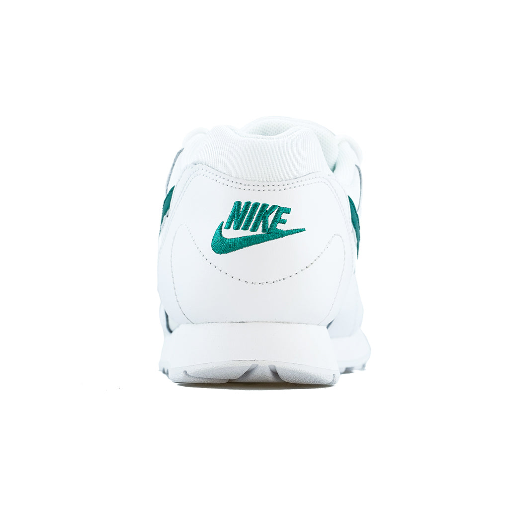 Nike outburst trainers in white and green hotsell